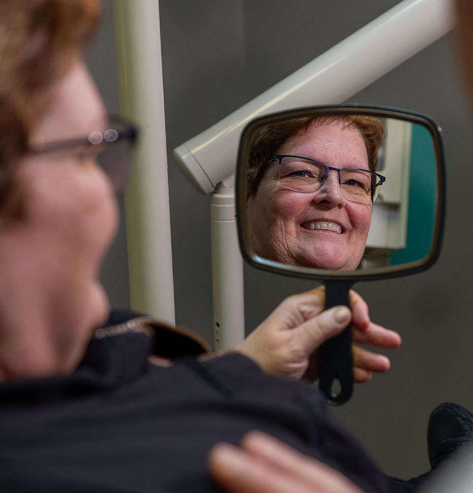 cindy looking at full arch mirror mobile