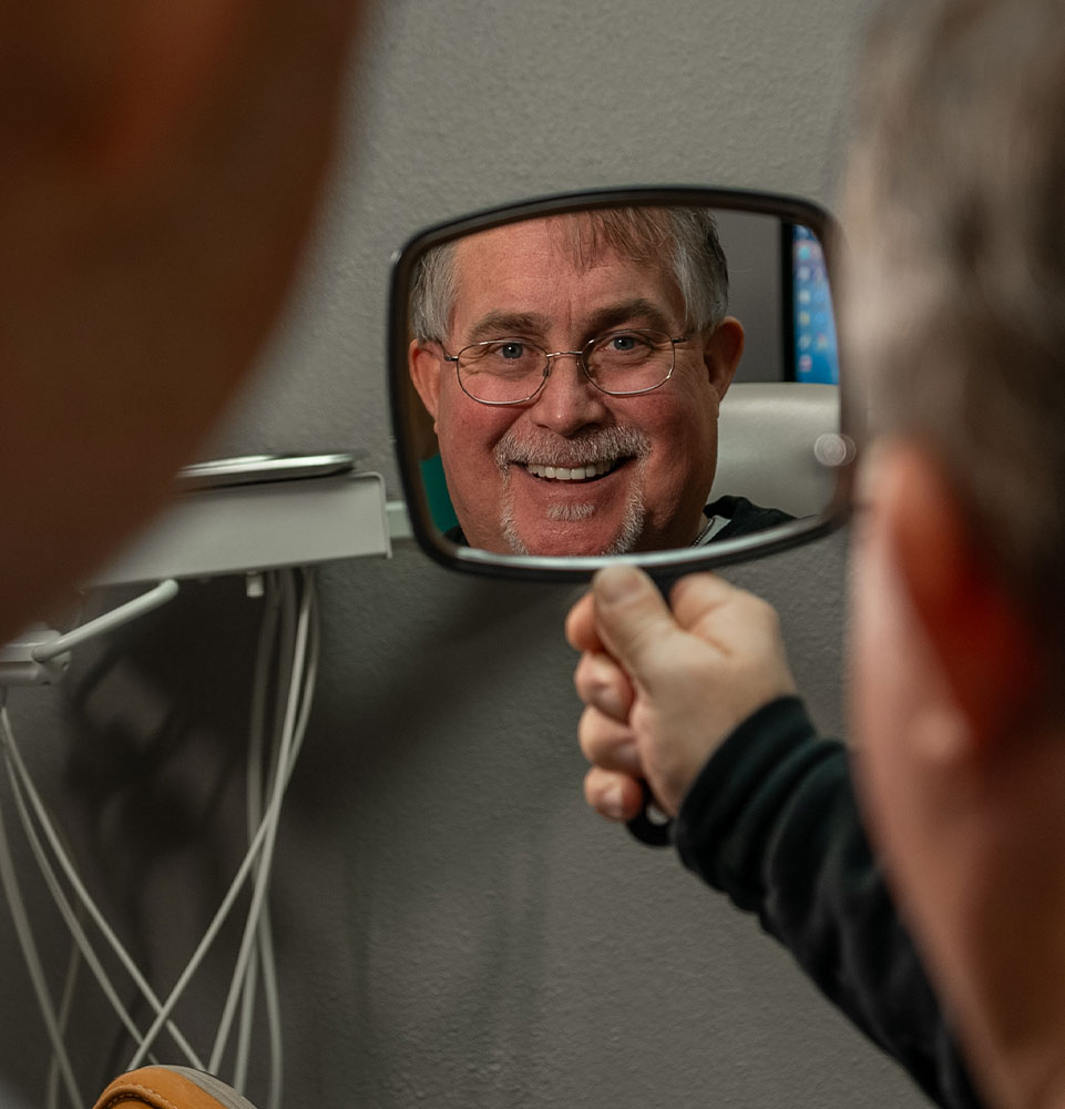 john with new dental crowns
