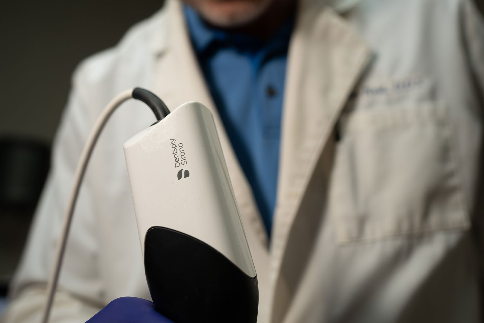 sirona scanner in dr burkes hands